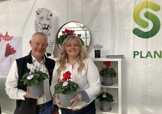Ton Koers & Kathy McKay -holding the Cyclamen Leopardo. "The Leopardo is a large flower type, known for its incredible heat tolerance and beautiful colors including a true red."